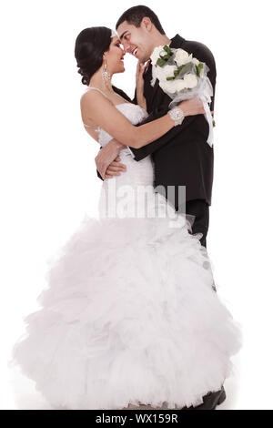 Primo ballo sposa e lo sposo su sfondo bianco Foto Stock