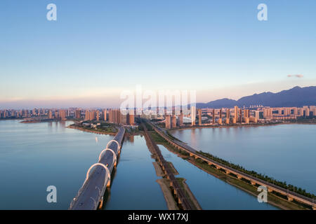 Jiujiang cityscape in sunset Foto Stock