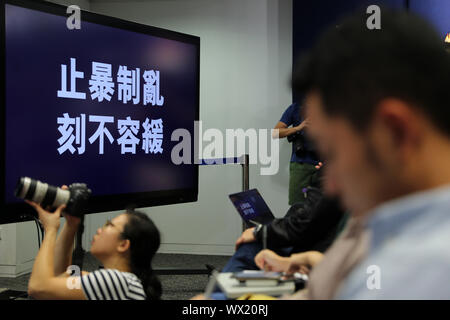 Hong Kong, Cina. Xvi Sep, 2019. I membri della stampa assistere a una breve conferenza stampa tenuta dalla polizia nel sud della Cina di Hong Kong, Sett. 16, 2019. Per andare con '1.453 persone arrestate sulla violenza a Hong Kong dal giugno: polizia' Credito: Luo Huanhuan/Xinhua/Alamy Live News Foto Stock