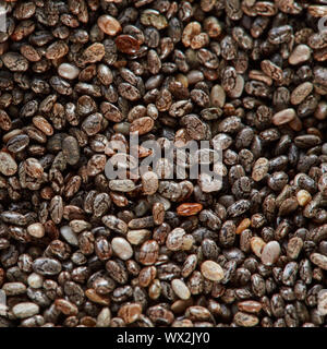 Texture di organico naturale semi di lino. Un sano materie super background close-up da semi di lino. Lay piatto Foto Stock