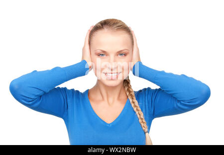 Immagine della donna sorridente con le mani sulle orecchie Foto Stock