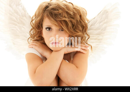 Immagine di un adolescente infelice Angel girl su bianco Foto Stock