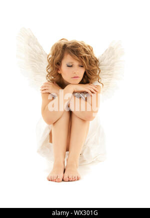 Immagine di un adolescente infelice Angel girl su bianco Foto Stock