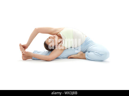 Bella ragazza la pratica di Ashtanga Yoga su bianco Foto Stock