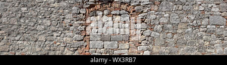 Rusticale Steinmauer in Postergroesse Foto Stock