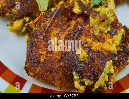 Il paneer e morsi di spinaci Foto Stock