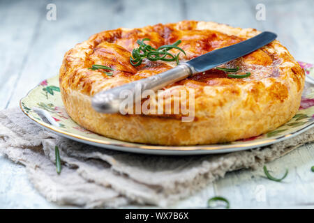 Il francese chiuso con torta di patate e rosmarino. Foto Stock