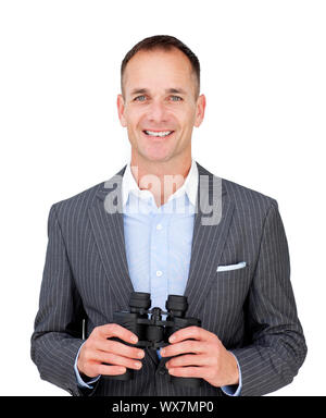 Happy businessman holding binocolo contro uno sfondo bianco Foto Stock