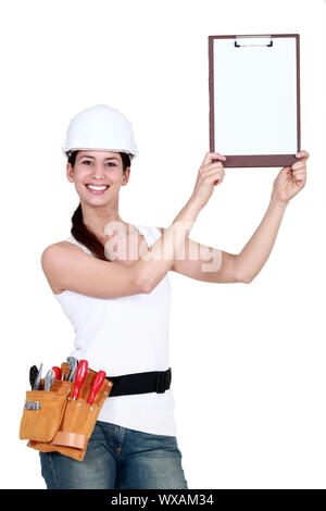 Attraente tradeswoman Foto Stock
