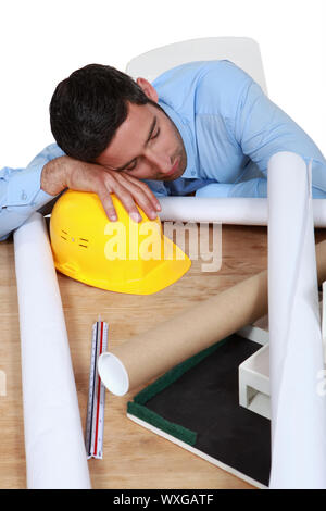 Architetto dormire sul posto di lavoro Foto Stock