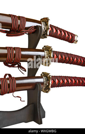 Chiudere isolata su bianco spade di samurai Foto Stock