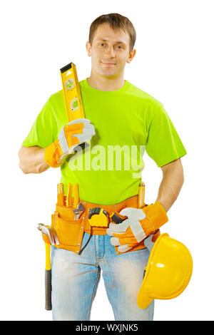 Lavoratore in verde t-shirt con strumenti Foto Stock