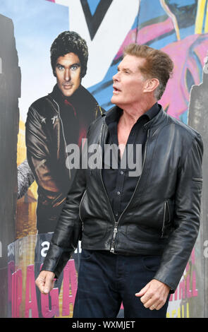 Berlino, Germania. Xvii Sep, 2019. David Hasselhoff si trova di fronte la East Side Gallery a una presentazione di Audible audio originale libro 'fino contro la parete - Missione Mauerfall'. La data di pubblicazione è il 3 ottobre 2019. Credito: Jens Kalaene/dpa-Zentralbild/dpa/Alamy Live News Foto Stock