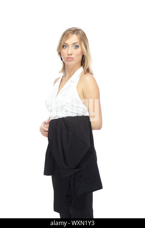 Donna bionda in abbigliamento formale sorge su uno sfondo bianco Foto Stock