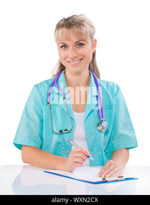 Medico donna al tavolo bianco Foto Stock