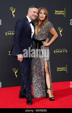 Los Angeles, CA. Xiv Sep, 2019. Raj Kapoor, Carrie Ann Inaba presso gli arrivi per il 2019 Creative Arts Emmy Awards, Microsoft Theatre, Los Angeles, CA il 14 settembre 2019. Credito: Priscilla concedere/Everett raccolta/Alamy Live News Foto Stock