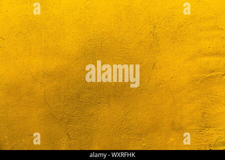 Sfondo giallo con texture adatto come sfondo per il testo Foto Stock