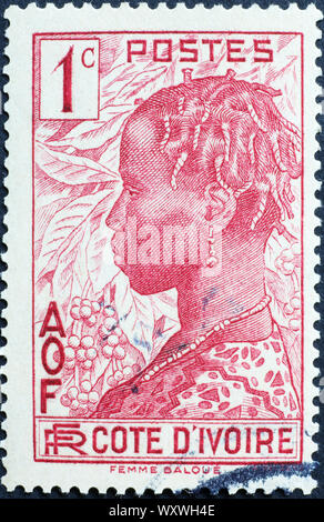 Ritratto di donna nera sul vecchio timbro africana Foto Stock
