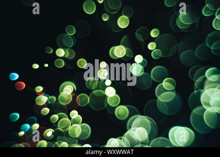 Bella ottico colore astratti bokeh nelle tenebre dello sfondo. Foto Stock